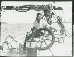 Image: Hubbard at wheel of Bowdoin
